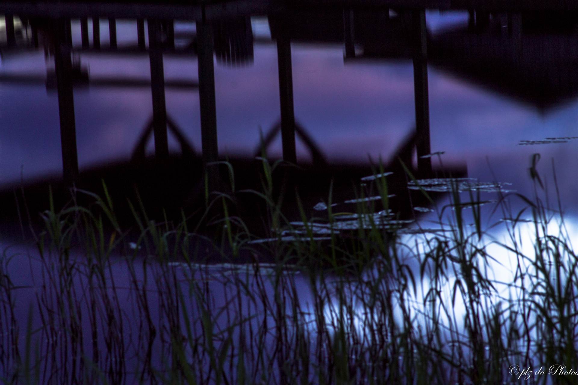Purple Haze Reflection of late sunset in June at Lake Waccamaw, NC by Patricia Zyzyk