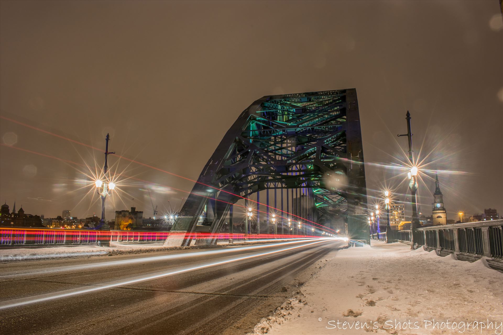 Light trails across a snowy tyne bridge (4).jpg  by Steven's Shots Photography
