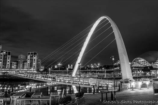 Black and white side view of the millenium bridge 6.3.18.jpg by Steven's Shots Photography