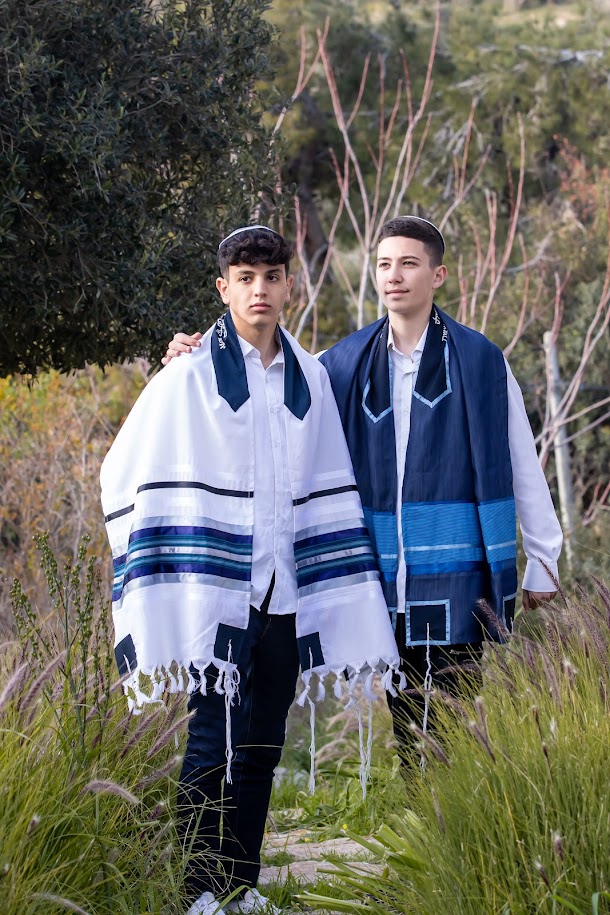 blue tallit Available in distinct geometric patterns and floral motifs, the exclusive collection of blue tallit from Galilee Silks, the famous Israeli Tallit designer, has all that you need! For more visit: https://www.galileesilks.com/collections/bar-mitzvah-tallit by amramrafi