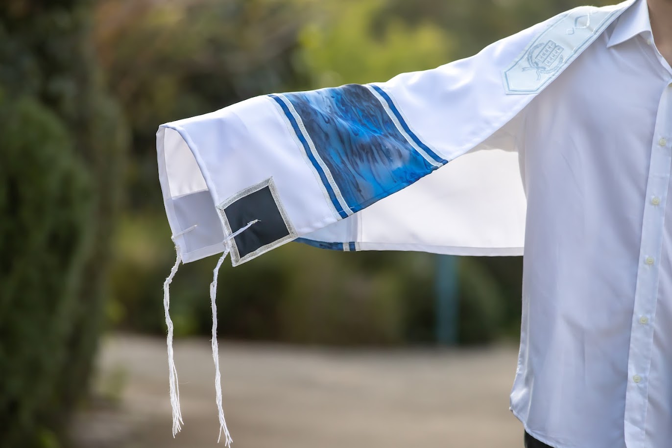 blue tallit Available in distinct geometric patterns and floral motifs, the exclusive collection of blue tallit from Galilee Silks, the famous Israeli Tallit designer, has all that you need! For more visit: https://www.galileesilks.com/collections/bar-mitzvah-tallit by amramrafi