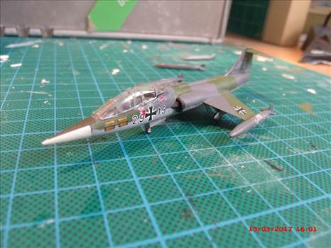 The building of a Model F-104 Starfighter from a kit.