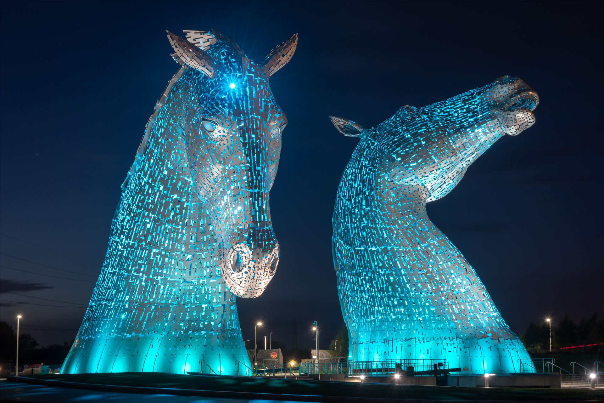 The Kelpies, Falkirk, Scotland - Blue Built of structural steel with a stainless steel cladding, The Kelpies are 30 metres high and weigh 300 tonnes each. Construction began in June 2013 by Graham Dobson Photography