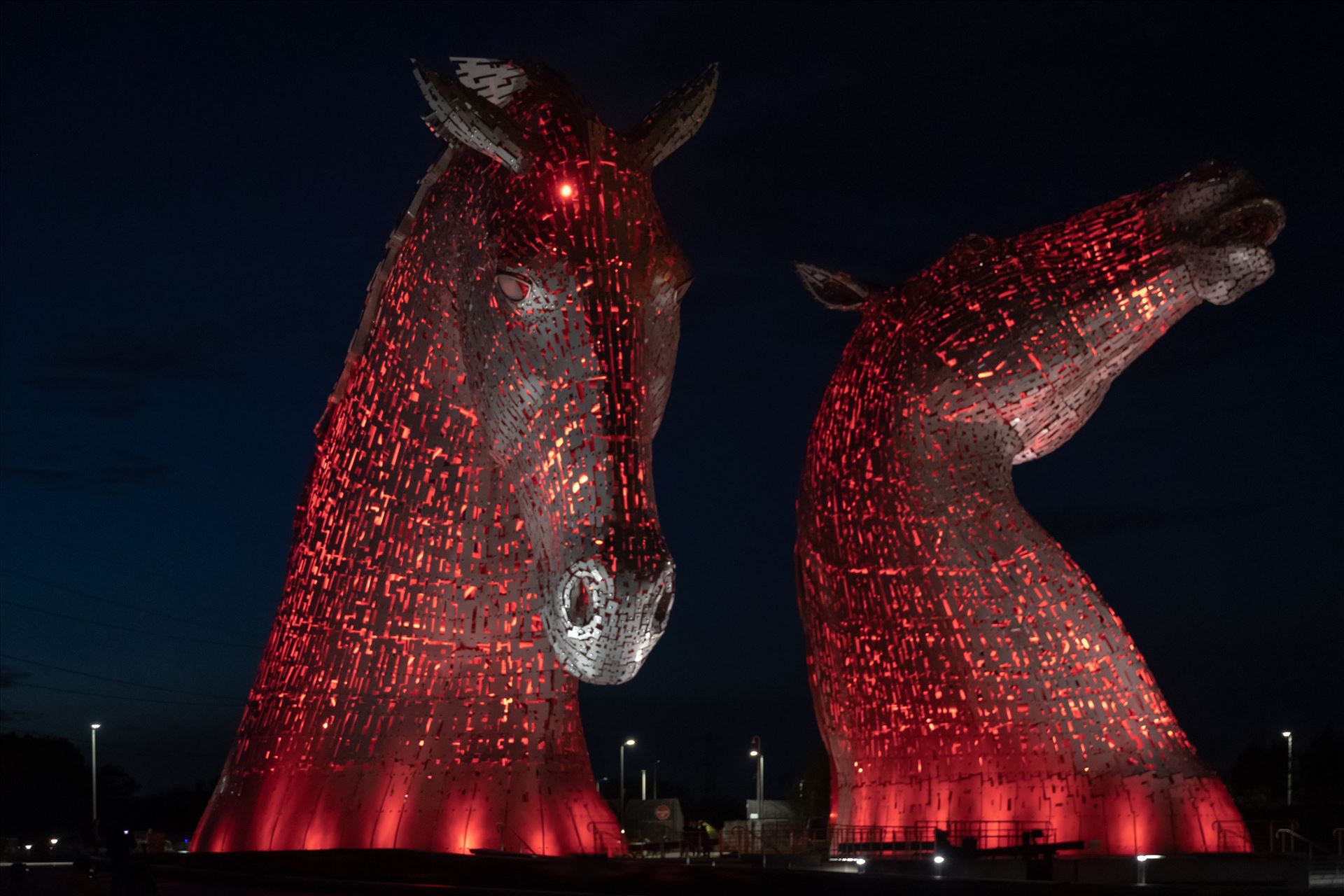 The Kelpies, Falkirk, Scotland - Red Built of structural steel with a stainless steel cladding, The Kelpies are 30 metres high and weigh 300 tonnes each. Construction began in June 2013 by Graham Dobson Photography