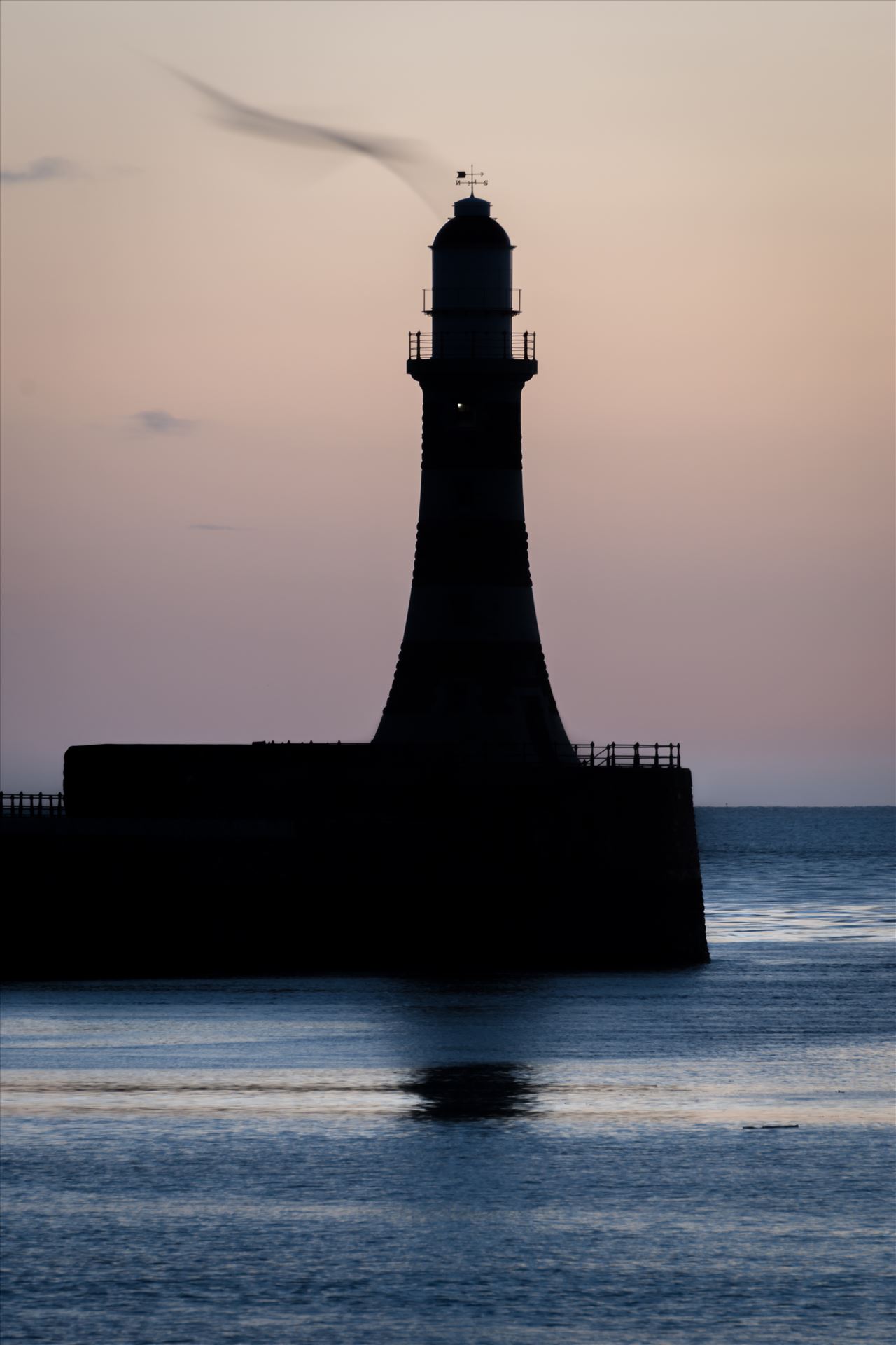 Roker lighthouse silhouette  by Graham Dobson Photography