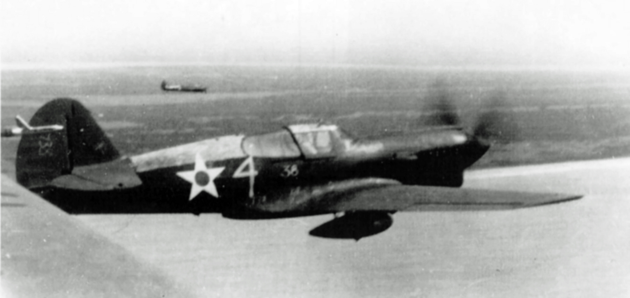 Curtiss-P-40E-Warhawk-AVG-Flying-Tigers-later-23rd-Fighter-Group-White-4-01.jpg  by modeldad