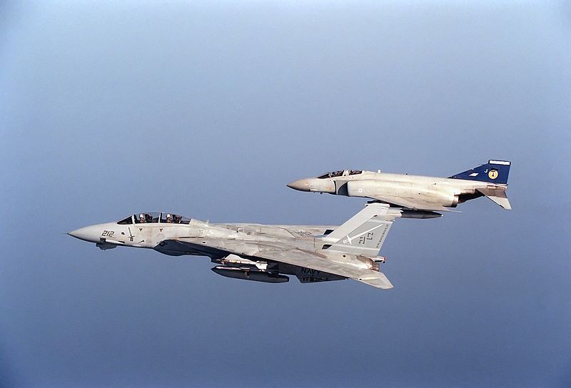 F-14A_Tomcat_of_VF-32_in_flight_with_Phantom_FGR.2_of_19_Squadron_RAF_on_21_December_1990.jpg  by At Sea