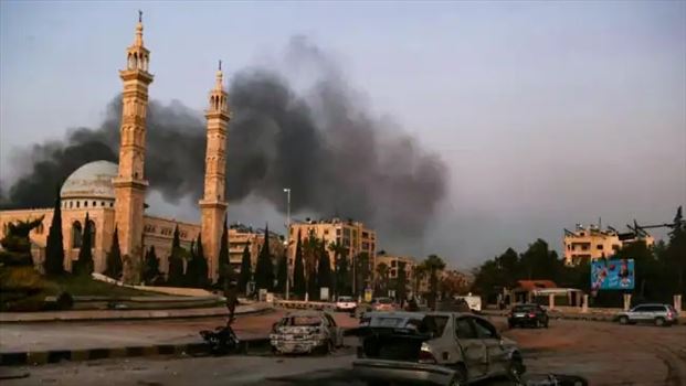 89e8533e-4486-4e43-87ea-e10dfb63b130_w650_r1_2_11zon.jpg - دوشنبه ۱۲ آذر ۱۴۰۳ ایران ۱۴:۵۰ \r\n آتش‌سوزی و ویرانی‌ به‌جا مانده از حمله نیروهای دولتی سوریه به مخالفان در شهر حلب – ۱۰ آذر ۱۴۰۳