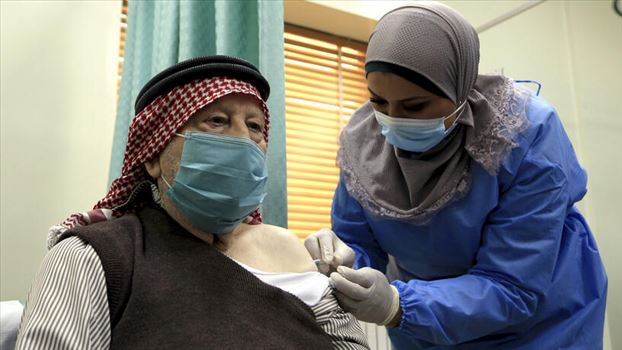 Virus Outbreak Jordan - دوشنبه ۲۹ دی ۱۳۹۹ | ۲۳:۰۰ ایران\r\nعکس روز: از جلسه بررسی استیضاح احتمالی پرزیدنت ترامپ تا واکسیناسیون کرونا در امان
