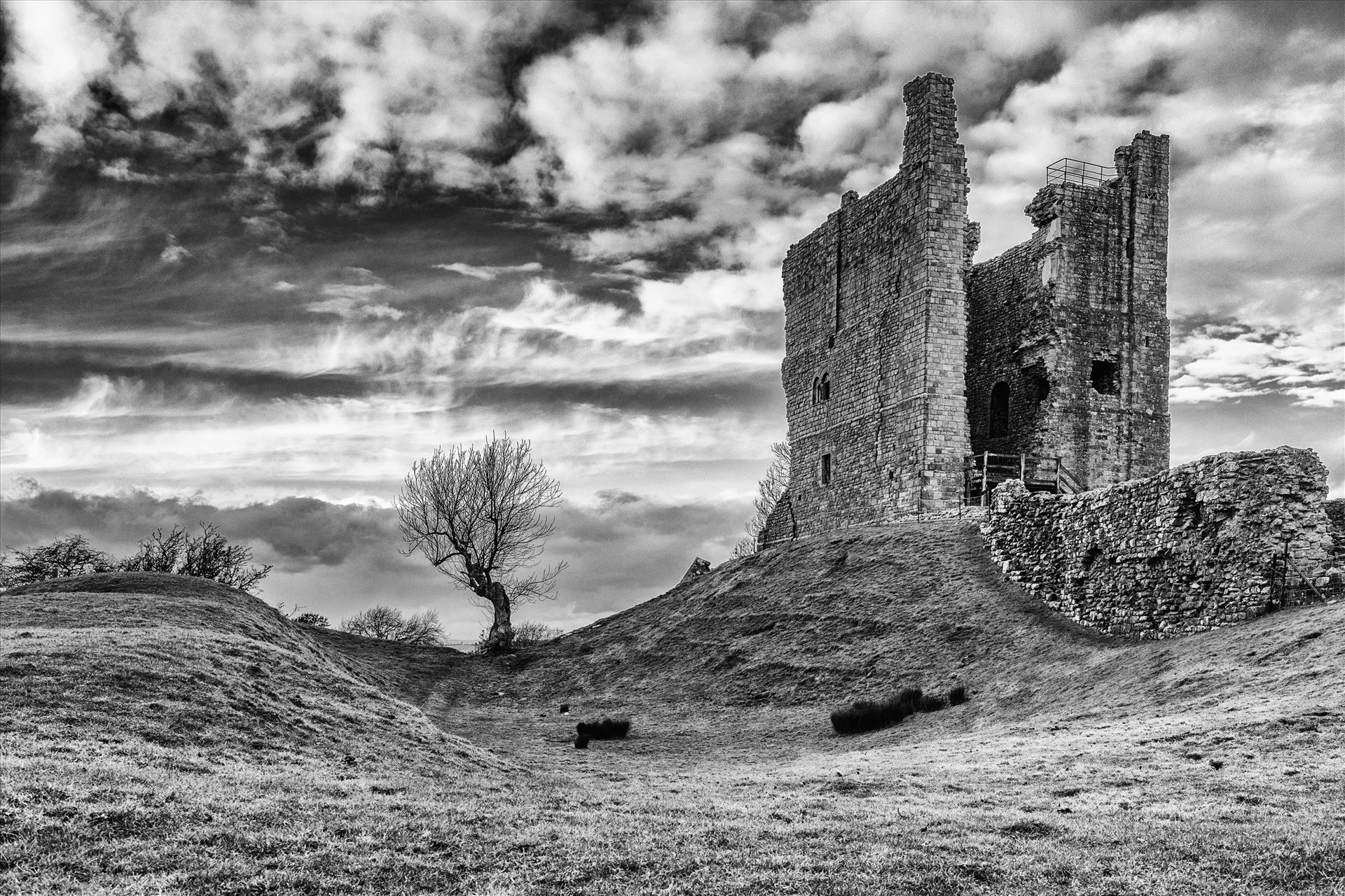 Brough Castle Brough Castle is a ruined castle in the village of Brough, Cumbria, England. The castle was built by William Rufus around 1092 within the old Roman fort of Verterae to protect a key route through the Pennine Mountains. by philreay