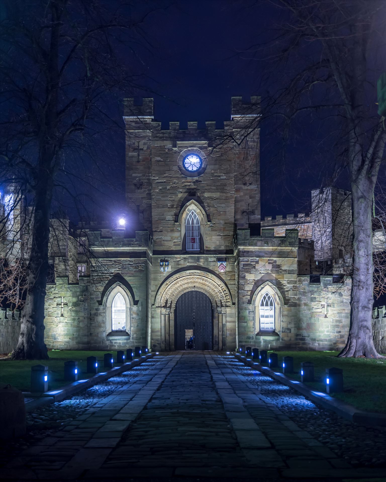 An arch leading to Durham Castle  by philreay