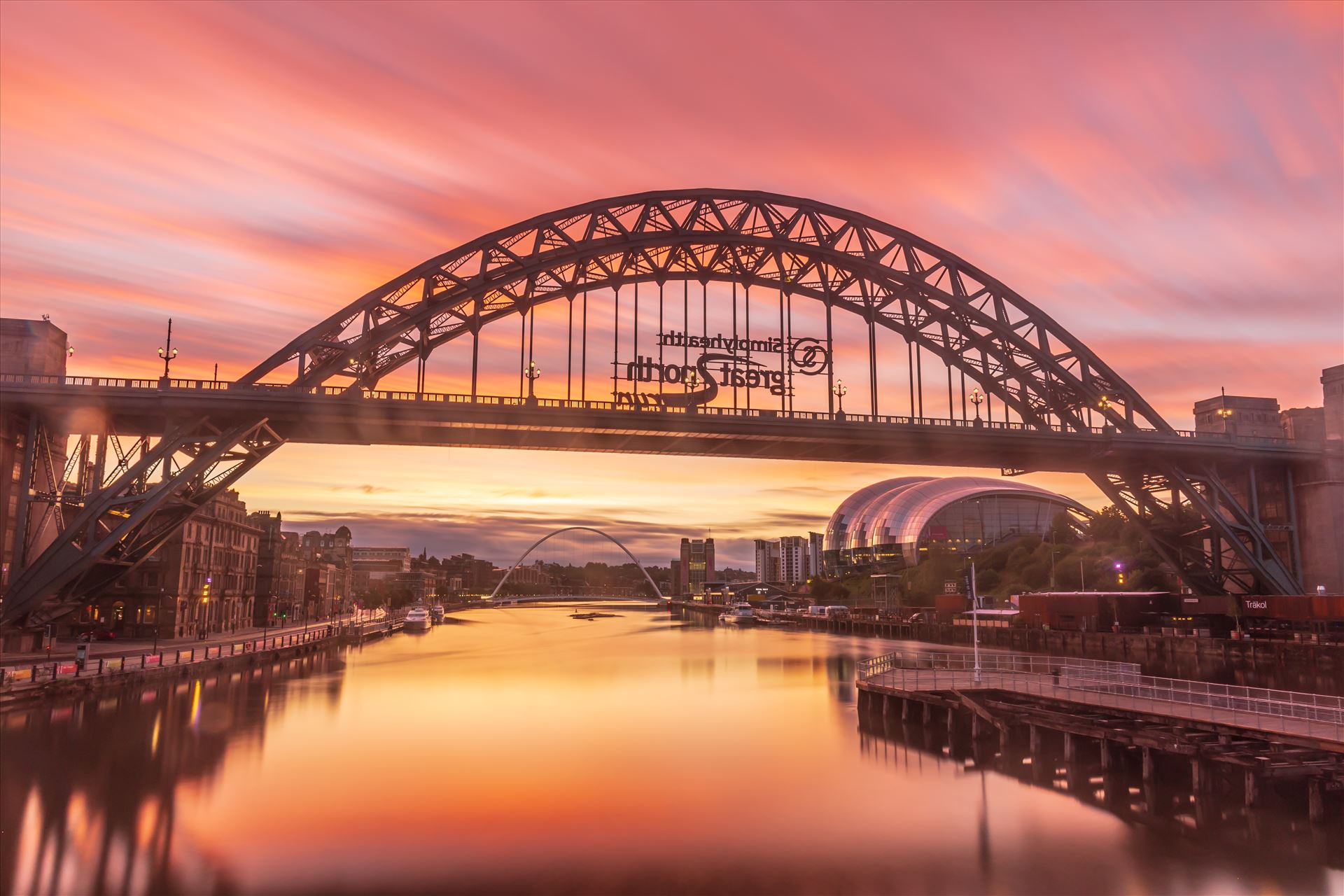 Sunrise on the Tyne bridge, Newcastle The exposure time on this one was 195 seconds to create the streaking effect in the clouds. by philreay