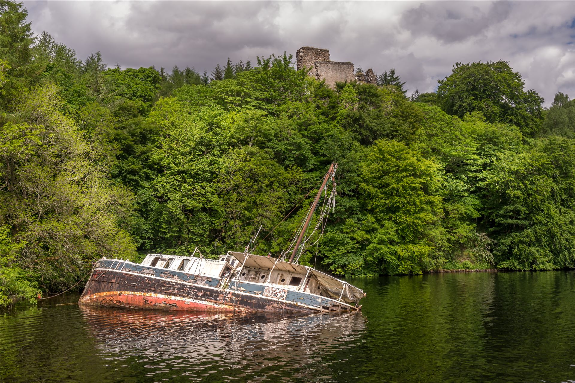 Invergarry Castle & the Eala Bhan The Eala Bhan shipwreck overlooked by Invergarry Castle on Loch Oich, part of the Caladonian Canal. by philreay