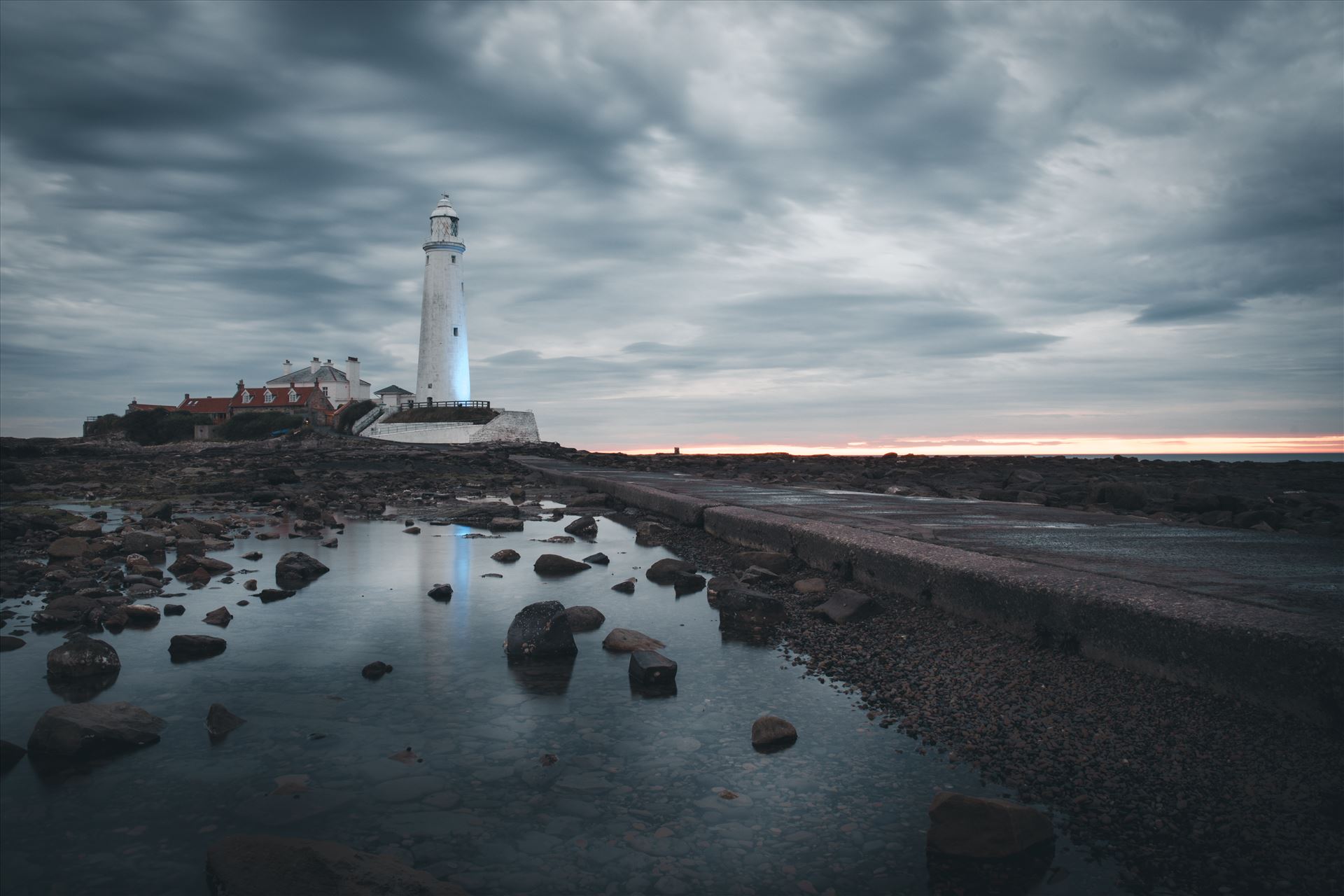 St Mary`s Island & lighthouse St Mary`s lighthouse stands on a small rocky tidal island which is linked to the mainland by a short concrete causeway and is submerged at high tide. The lighthouse was built in 1898 & was decommissioned in 1984, 2 years after becoming automatic. by philreay
