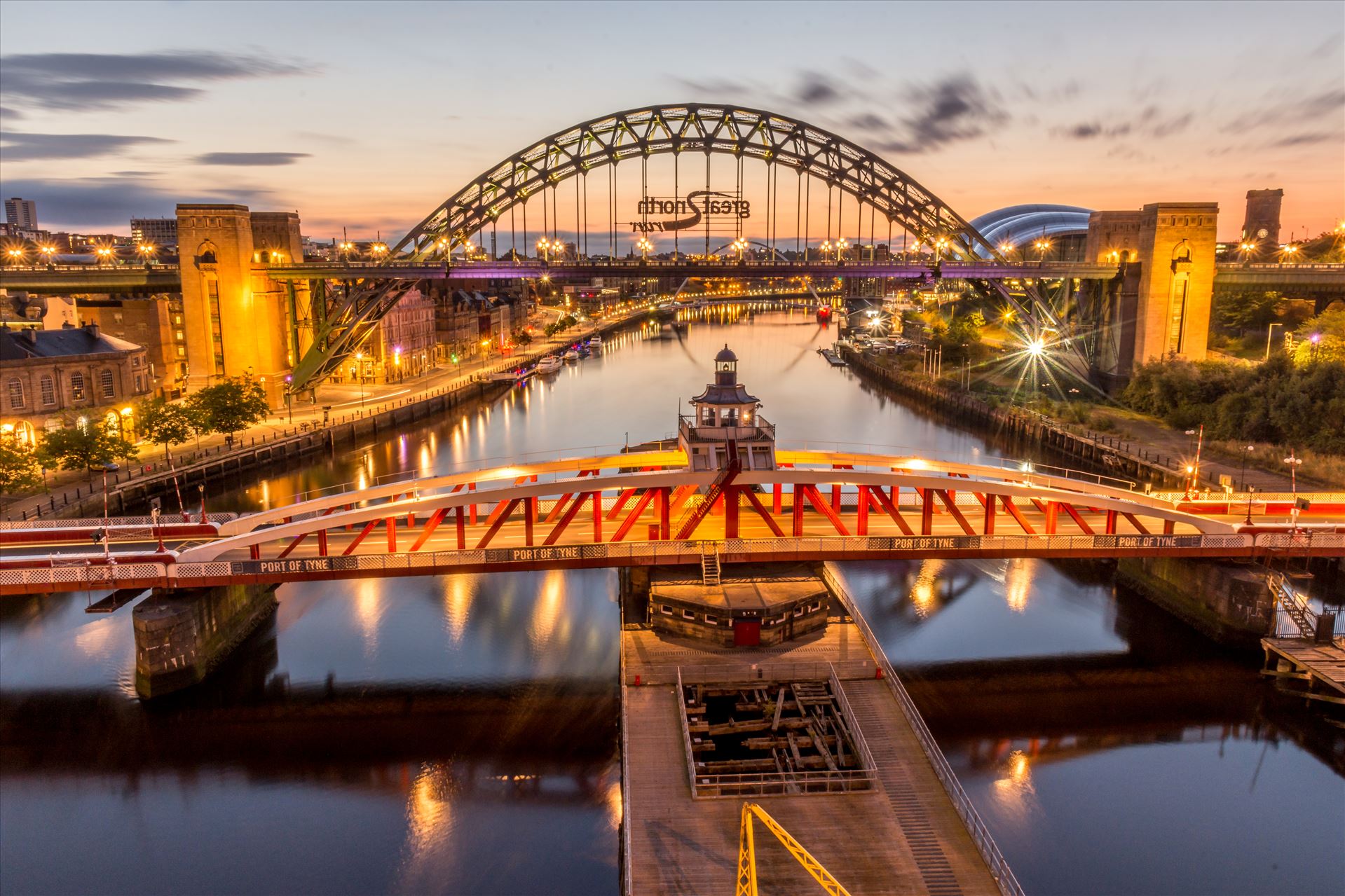 The River Tyne In the foreground is the Swing bridge, at the top is the world famous Tyne bridge & under that is the Millennium bridge. by philreay
