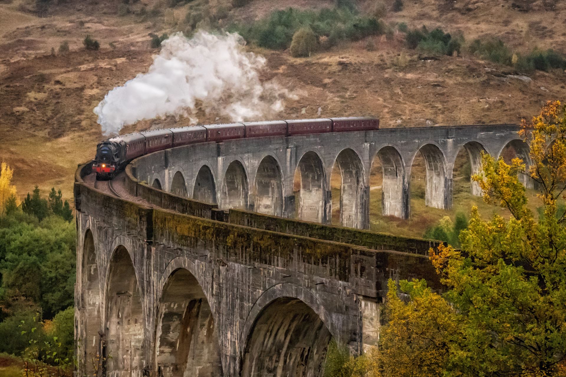 The Glenfinnan Viaduct (2) The Glenfinnan viaduct is a railway viaduct on the West Highland line which connects Fort William and Malaig. The viaduct has been the location for many films and tv series but probably most famous for the Harry Potter films. by philreay
