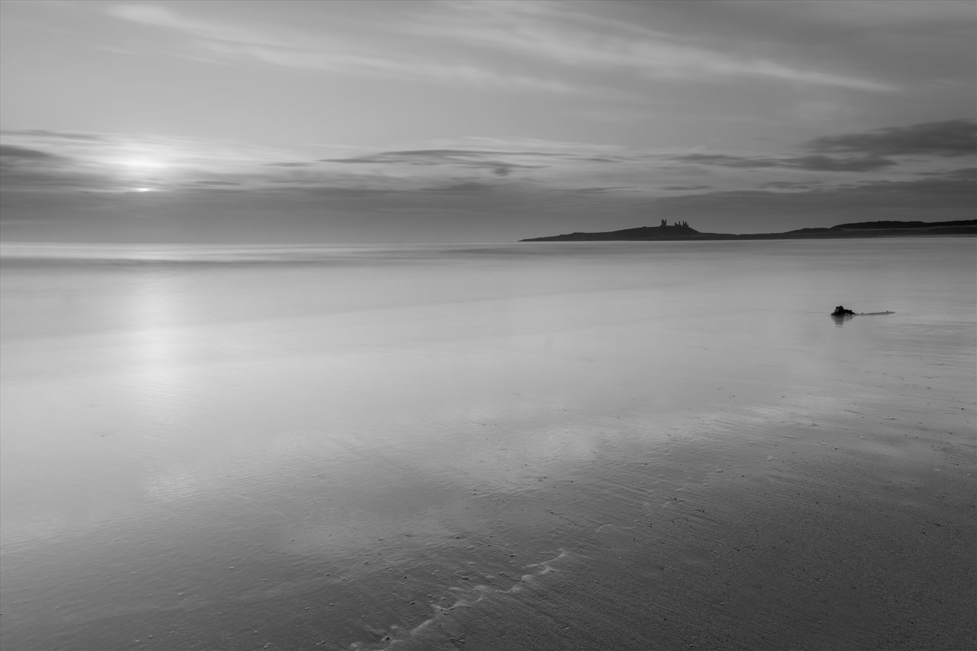 Sunrise at Embleton Bay, Northumberland. (also in colour) Embleton Bay is a bay on the North Sea, located to the east of the village of Embleton, Northumberland, England. It lies just to the south of Newton-by-the-Sea and north of Craster by philreay
