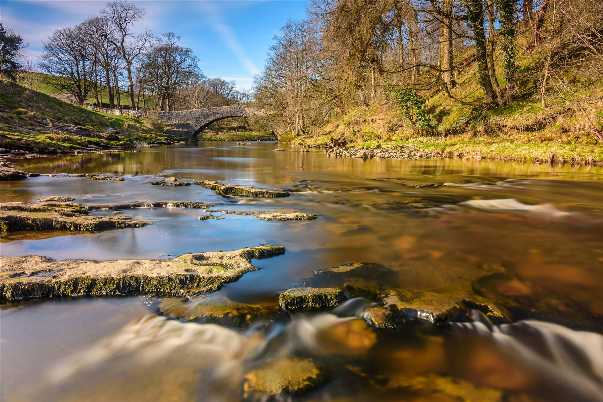 The River Ribble This long exposure shot of 98 seconds was taken on the River Ribble near the small town of Settle, which sits at the southern edge of the Yorkshire Dales. by philreay