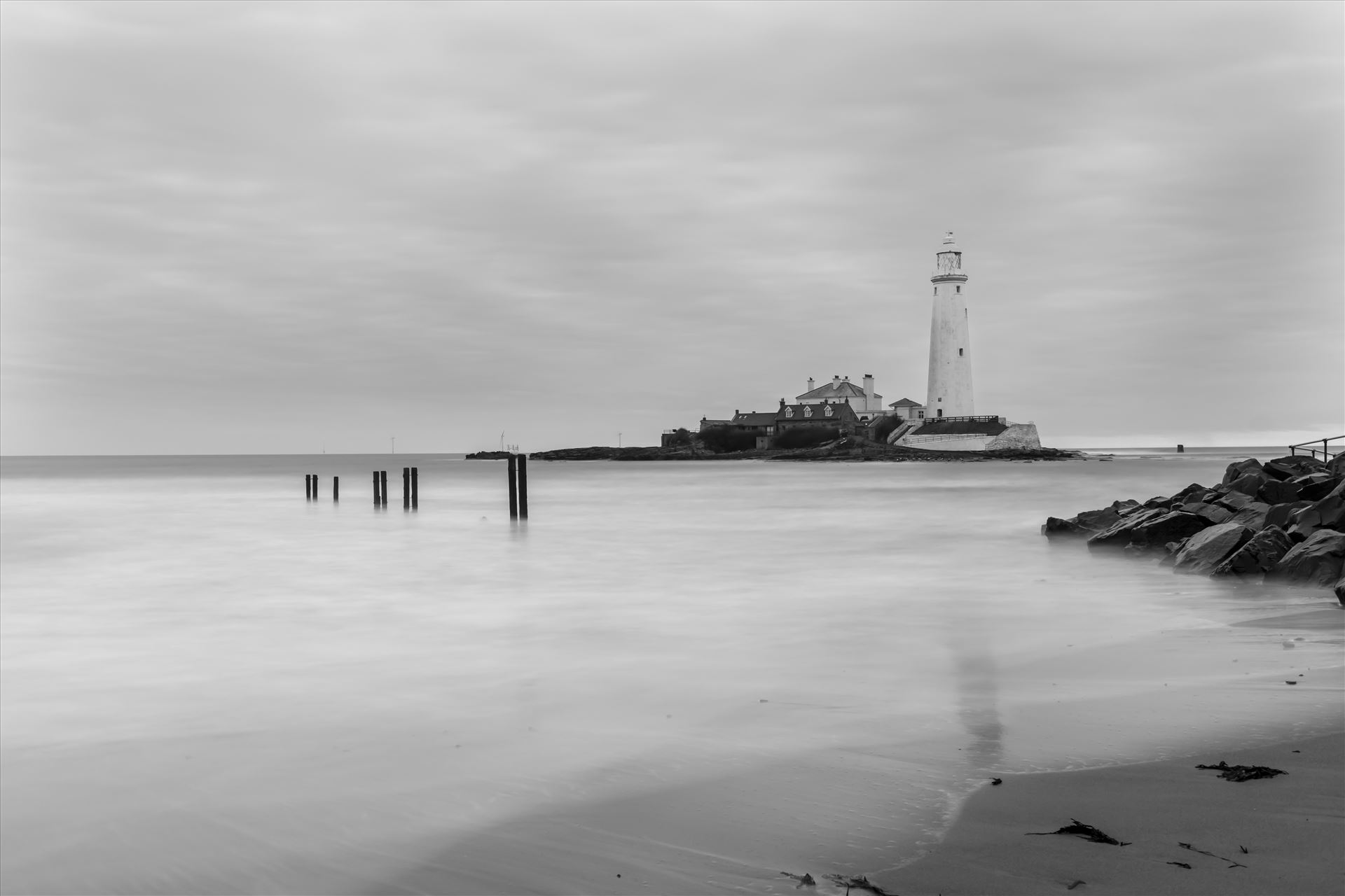 St Mary`s lighthouse, Whitley Bay (B&W) St Mary`s lighthouse stands on a small rocky tidal island is linked to the mainland by a short concrete causeway which is submerged at high tide. The lighthouse was built in 1898 & was decommissioned in 1984, 2 years after becoming automatic. by philreay