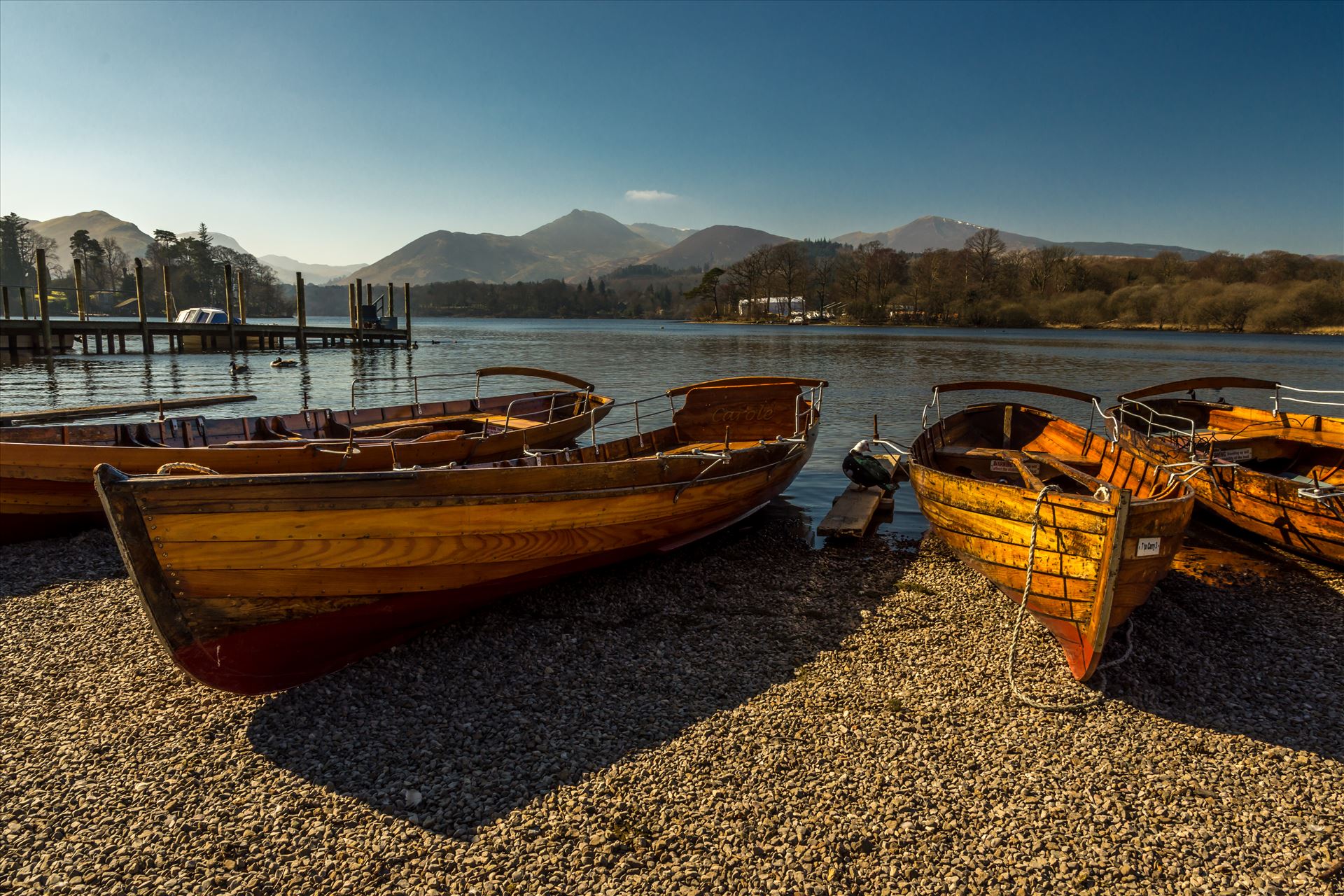 Rowing boats at Derwentwater  by philreay