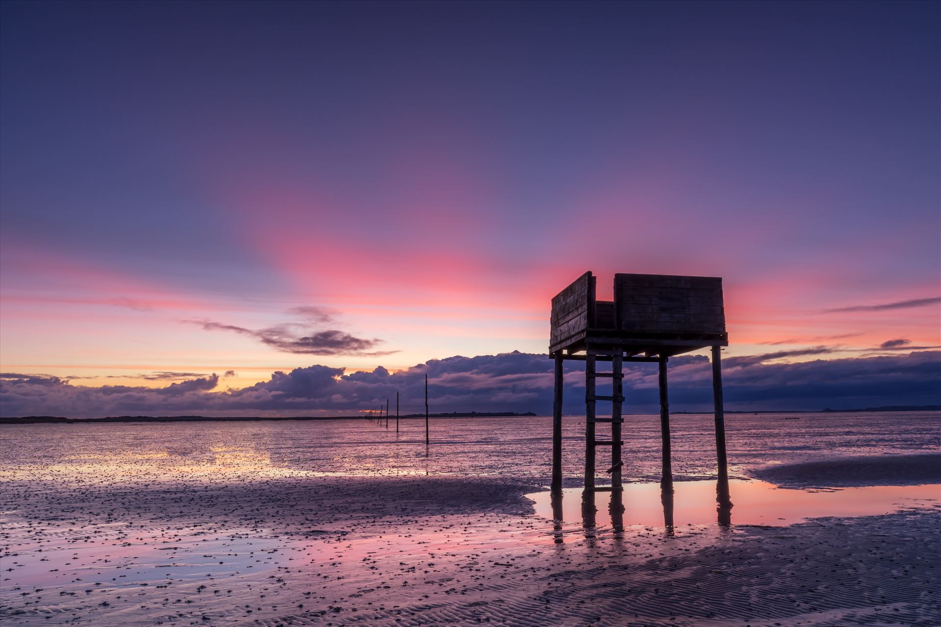 Sunrise at Holy Island The Holy Island of Lindisfarne is a tidal island off the northeast coast of England. It is also known just as Holy Island & is now a popular destination for visitors to the area. by philreay