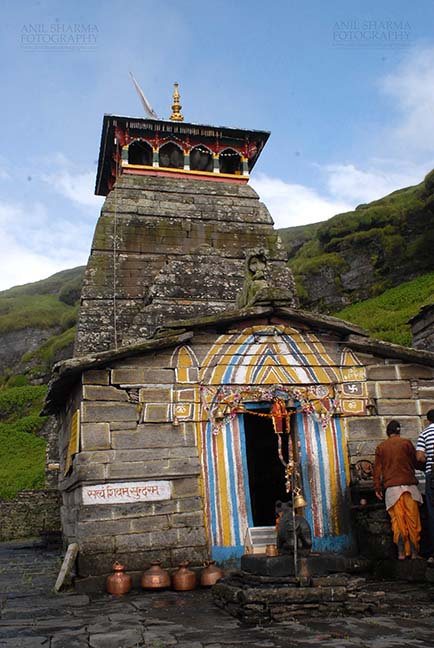Religion- Tungnath Temple, Tungnath, Rudraprayag, Uttarakhand, India. (Photo: Atul Sharma) Tungnath, Chopta, Uttarakhand, India- August 18, 2009: Devotees at the Main Tungnath temple complex at Tungnath, Chpota, Uttarakhand, India. by Anil