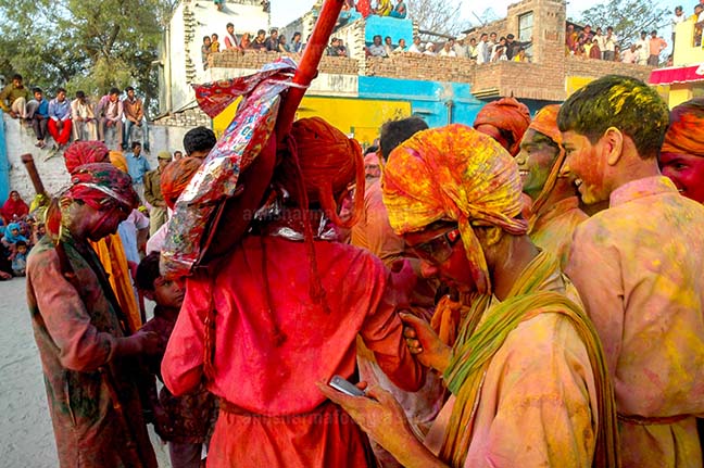Festivals- Lathmaar Holi of Barsana (India) Local people daubed in color powder during Lathmaar Holi celebration at Barsana, Mathura, Uttar Pradesh, India. by Anil