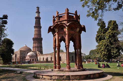 Monuments- Qutab Minar, New Delhi, India. A Red sendstone Bengal style chhattri or MajorRobert Smith’s Folly, Qutub Minar and Alai Darwaza at Qutub Minar Complex, Mehrauli, New Delhi, India. by Anil