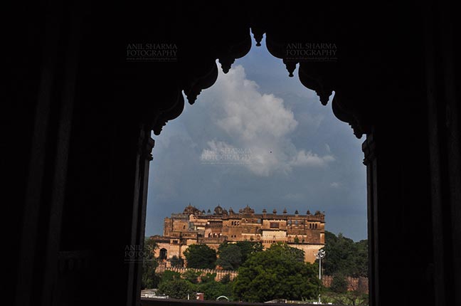 Monuments- Palaces and Temples of Orchha, Madhya Pradesh, India. (Photo: Atul Sharma) Orchha, Madhya Pradesh, India- August 20, 2012: Jahangir Mahal, Citadel of Jahangir, viewed from Chaturbhuj Temple, Orchha, Madhya Pradesh, India. by Anil