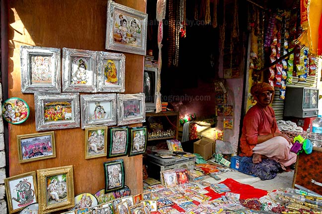 Festivals- Lathmaar Holi of Barsana (India) A religious paintings and material shop at Barsana, Mathura, Uttar Pradesh, India. by Anil