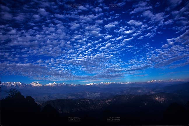 Clouds- Sky with Clouds (Binsar) Sky with Clouds, Binsar, Uttarakhand, India- 14 December, 2006: Dark Blue color sky with clouds, at Binsar, Uttarakhand, India. by Anil