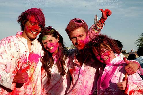 Festivals- Holi and Elephant Festival, Jaipur. Rajasthan, India. (Photo: Atul Sharma) Foreign tourists enjoying Holi and Elephant Festival at Jaipur, Rajasthan, India. by Anil