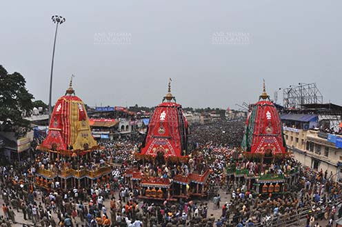 Festivals- Jagannath Rath Yatra (Odisha) The chariots of Lord Jagannath, Balbhadra and Subhadra traditionally decorated, parked in front of the Jagannath temple at Puri, Odisha, India. by Anil