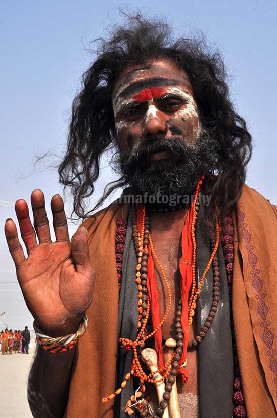 Culture- Aghori Sadhu, Allahabad, Uttar Pradesh, India. (Photo: Atul Sharma) Aghori Sadhu with long hair, ash and tilak on face, wearing human bones and rudraksha bead at Mahakumbh, Allahabad, Uttar Pradesh, India. by Anil