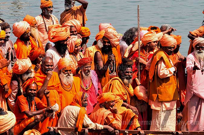 Culture- Naga Sadhu’s (India) A group of Naga Sadhu's in a Boat returning to their camps at Varanasi. by Anil