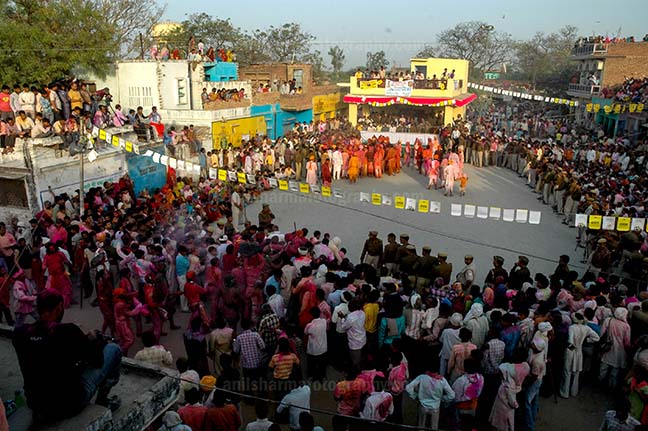 Festivals- Lathmaar Holi of Barsana (India) Local people celebrating Holi festival at Nandgoan Mathura, Uttar Pradesh, India. by Anil