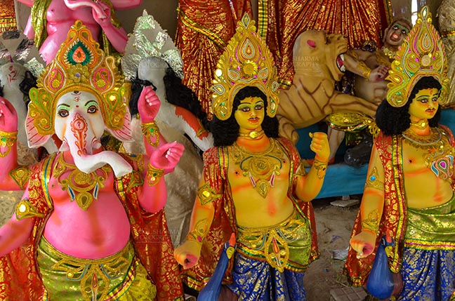 Festivals- Durga Puja Festival Durga Puja Festival, Noida, Uttar Pradesh, India- September 21, 2017: Clay idols of Hindu Gods and Goddess in a workshop at Noida, Uttar Pradesh, India. by Anil