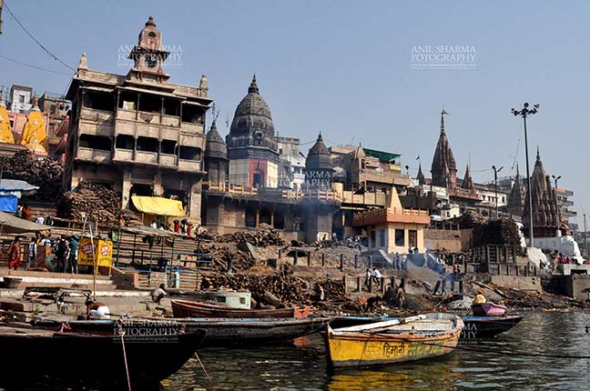 Travel- Varanasi the city of light (India) The Manikarnika Ghats is the main Traditional Hindu cremation place where Hindu bodies are cremated at Varanasi, Uttar Pradesh, India. by Anil