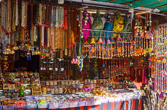 Fairs- Pushkar Fair (Rajasthan) Pushkar, Rajasthan, India- May 23, 2008: Necklaces, beads, jewelry, gemstones, bracelets, earrings, bangles at Pushkar fair, Rajasthan, India. by Anil