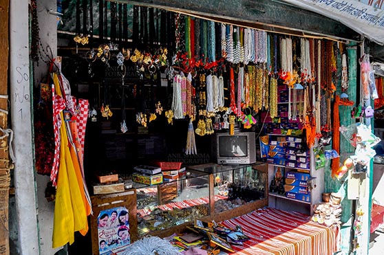 Travel- Gangotri (Uttarakhand) Gangotri, Uttarakhand, India- May 13, 2015: Shops of necklaces, beads, jewelry, gemstones, bracelets, earrings, bangles and devotional objects for religious ceremonies at Gangotri, Uttarkashi, Uttarakhand, India. by Anil