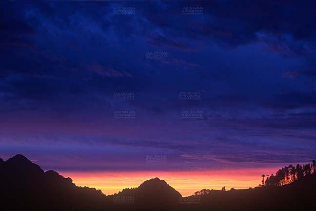 Clouds- Sky with Clouds (Mussoorie) Mussoorie, Uttarakhand, India- 14 December 2006: Sunset view, dark blue sky with clouds, at Mussoorie, India. (Photo By Atul Sharma) by Anil