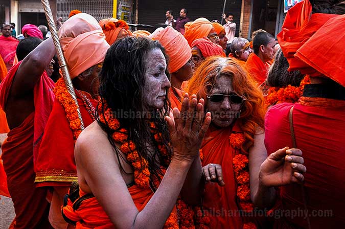 Culture- Naga Sadhu’s (India) Women Naga Sadhu's procession passing through the streets of Varanasi. by Anil