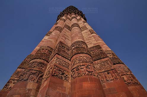 Monuments- Qutab Minar, New Delhi, India. (Photo: Atul Sharma) Qutab Minar with Architecure details and verses from Holy Quran at Qutab Minar Complex, New Delhi, India. by Anil