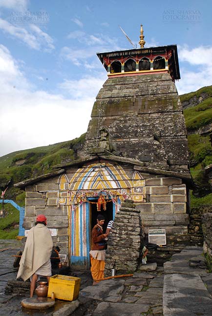 Religion- Tungnath Temple, Uttarakhand (India) Tungnath, Chopta, Uttarakhand, India- August 18, 2009: Prist and devotees at the Main Tungnath temple complex at Tungnath, Chpota, Uttarakhand, India. by Anil