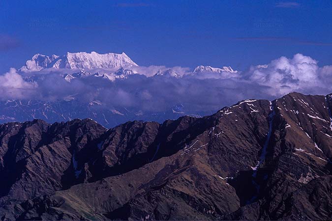Mountains- Chaukhamba Peaks (India) Snow covered Chaukhamba Peak in Garhwal Himalayas in Uttarakhand India. by Anil