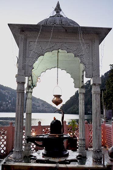 Travel- Nainital (Uttarakhand) Nainital, Uttarakhand, India- November 11, 2015: Shivling at Naina Devi Temple, the temple devoted to Maa Naina Devi is situated right on Naini Lake near Flat at Mallital, Nainital, Uttarakhand India. by Anil