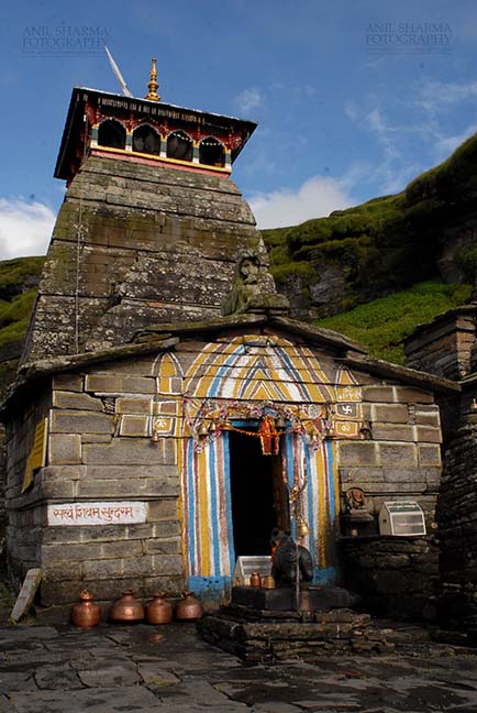 Religion- Tungnath Temple, Uttarakhand (India) Tungnath, Chopta, Uttarakhand, India- August 18, 2009: Main Tungnath temple complex with Hanging bells on the door at Tungnath, Chpota, Uttarakhand, India. by Anil
