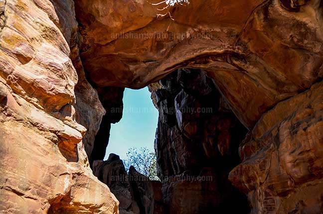 Archaeology- Bhimbetka Rock Shelters (India) Interior of a cave at Bhimbetka archaeological site at Raisen, Madhya Pradesh, India. by Anil