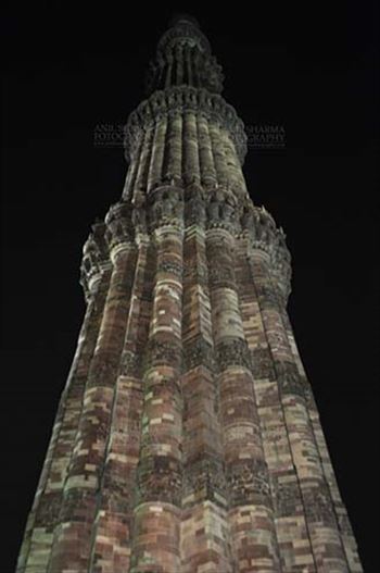 Monuments- Qutab Minar in Night, New Delhi, India. by Anil