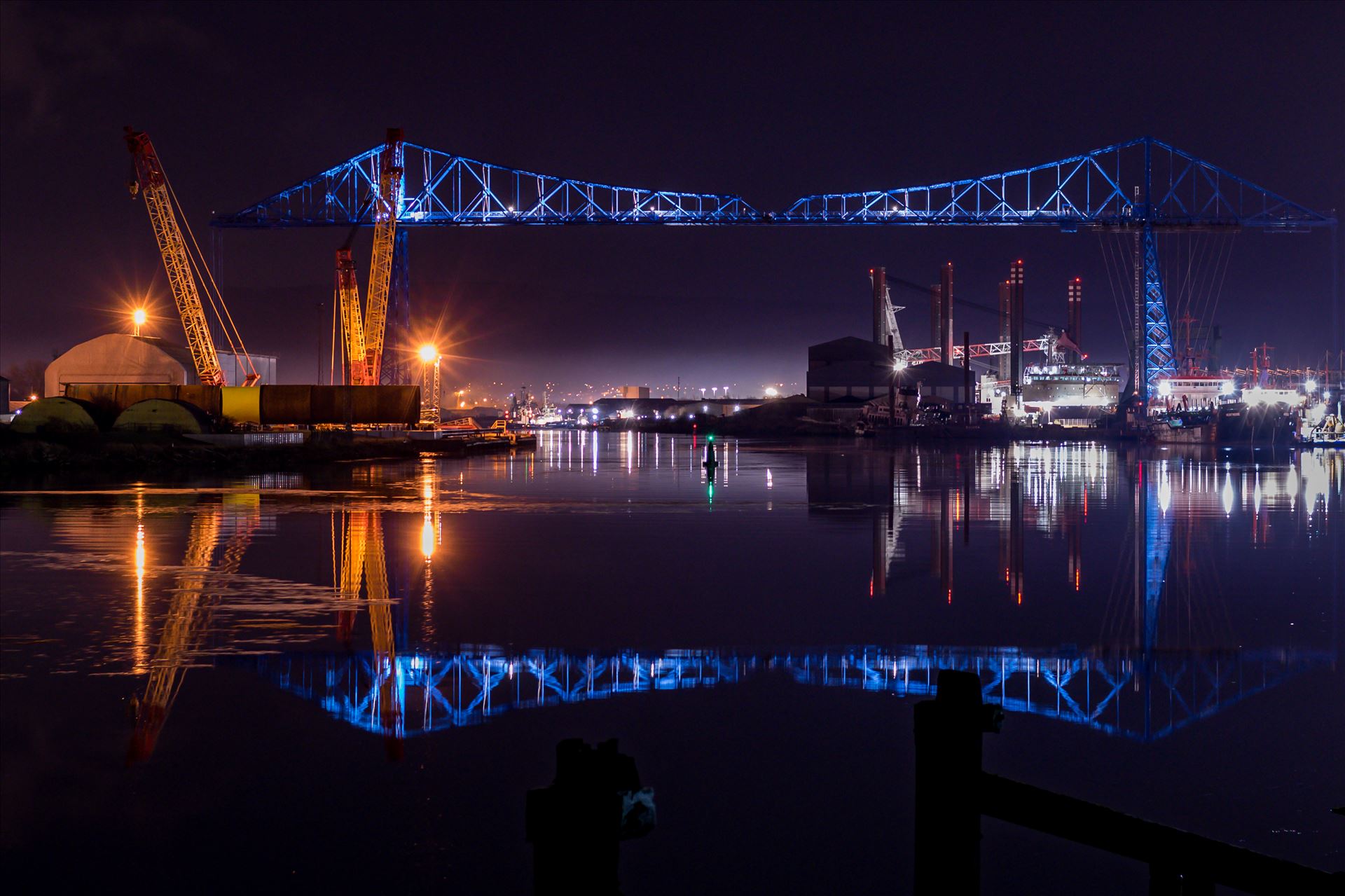 Transporter Bridge Reflections The Transporter Bridge Reflection. To buy this image or many more of this iconic bridge, follow the link
https://www.clickasnap.com/i/ozo4f31dpbldx6zo by AJ Stoves Photography
